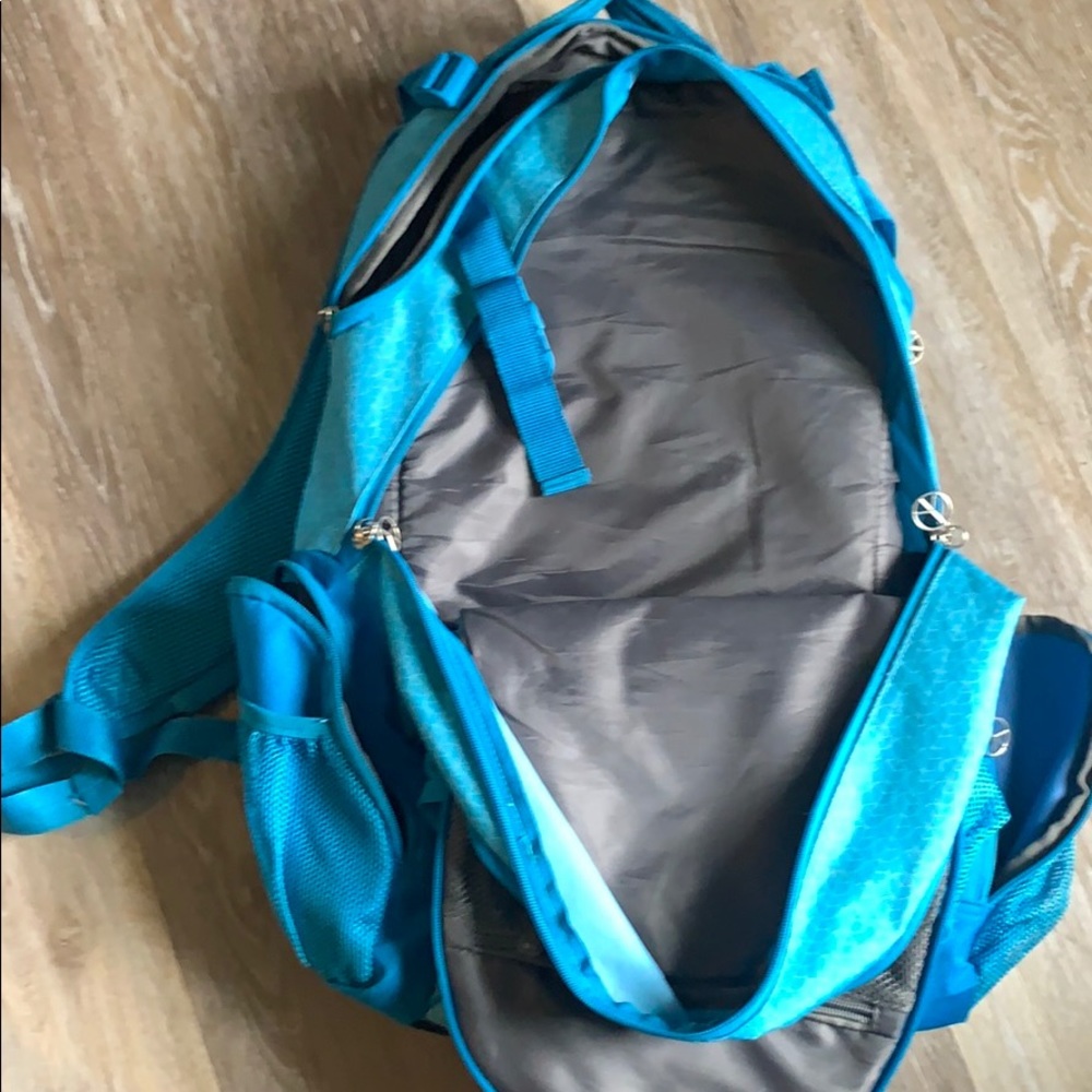 Backpack with multiple utility pockets. - Picture 3 of 3